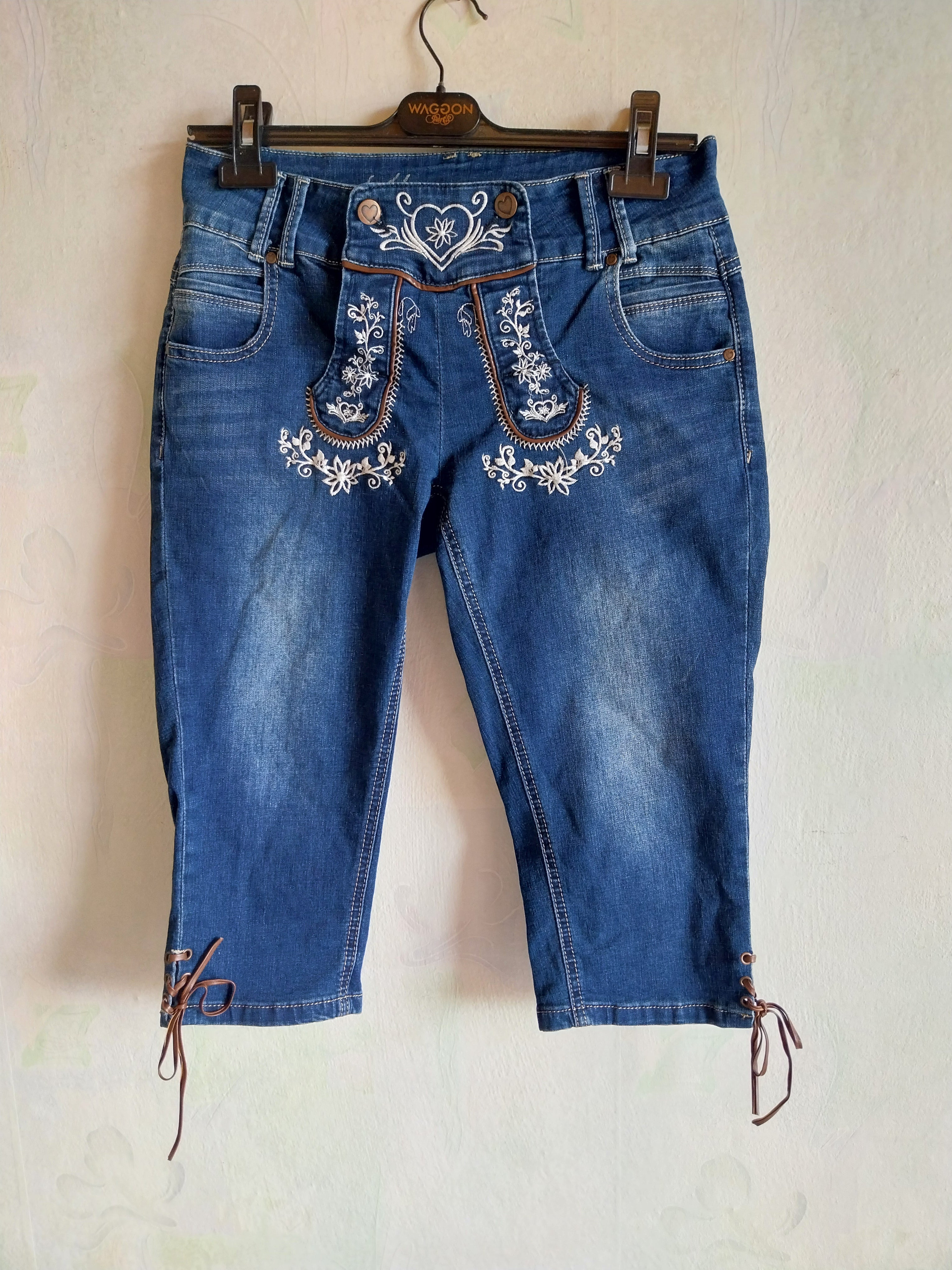 MyHailys Tracht embroidered denim capri jeans with white floral embroidery and lace-up ankles