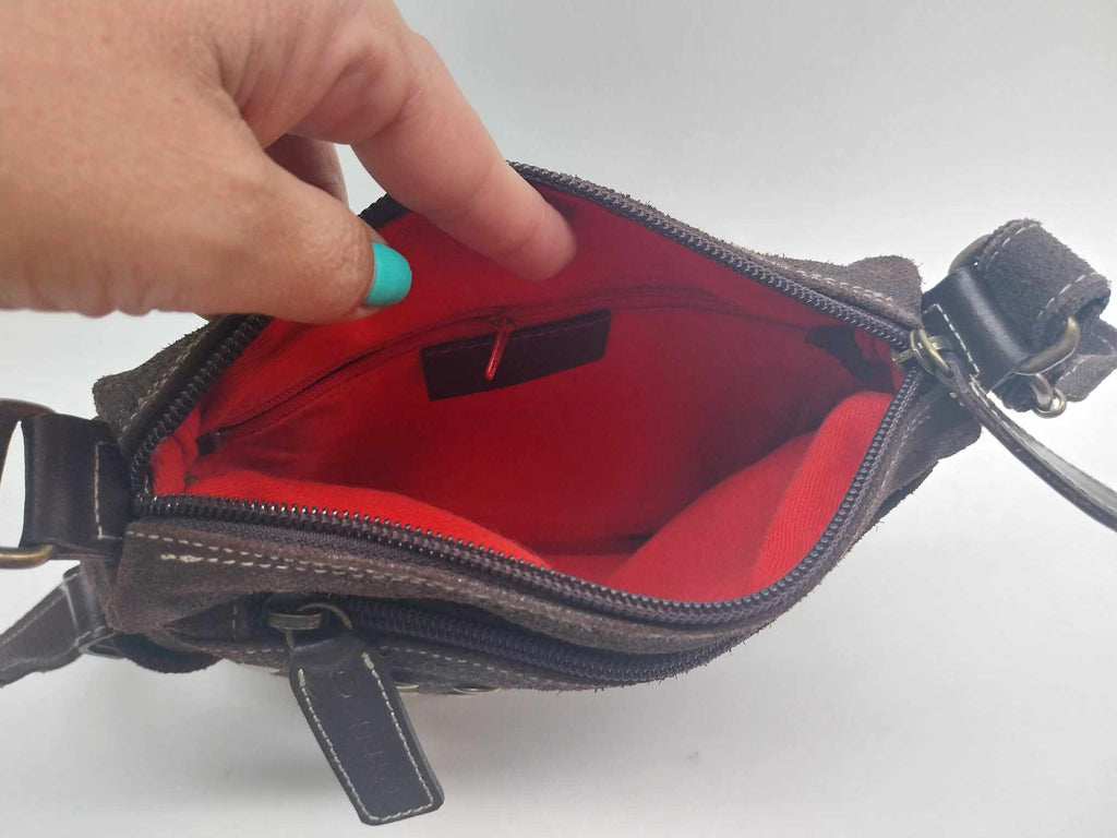 PINKO bag interior — red lining with slip pocket