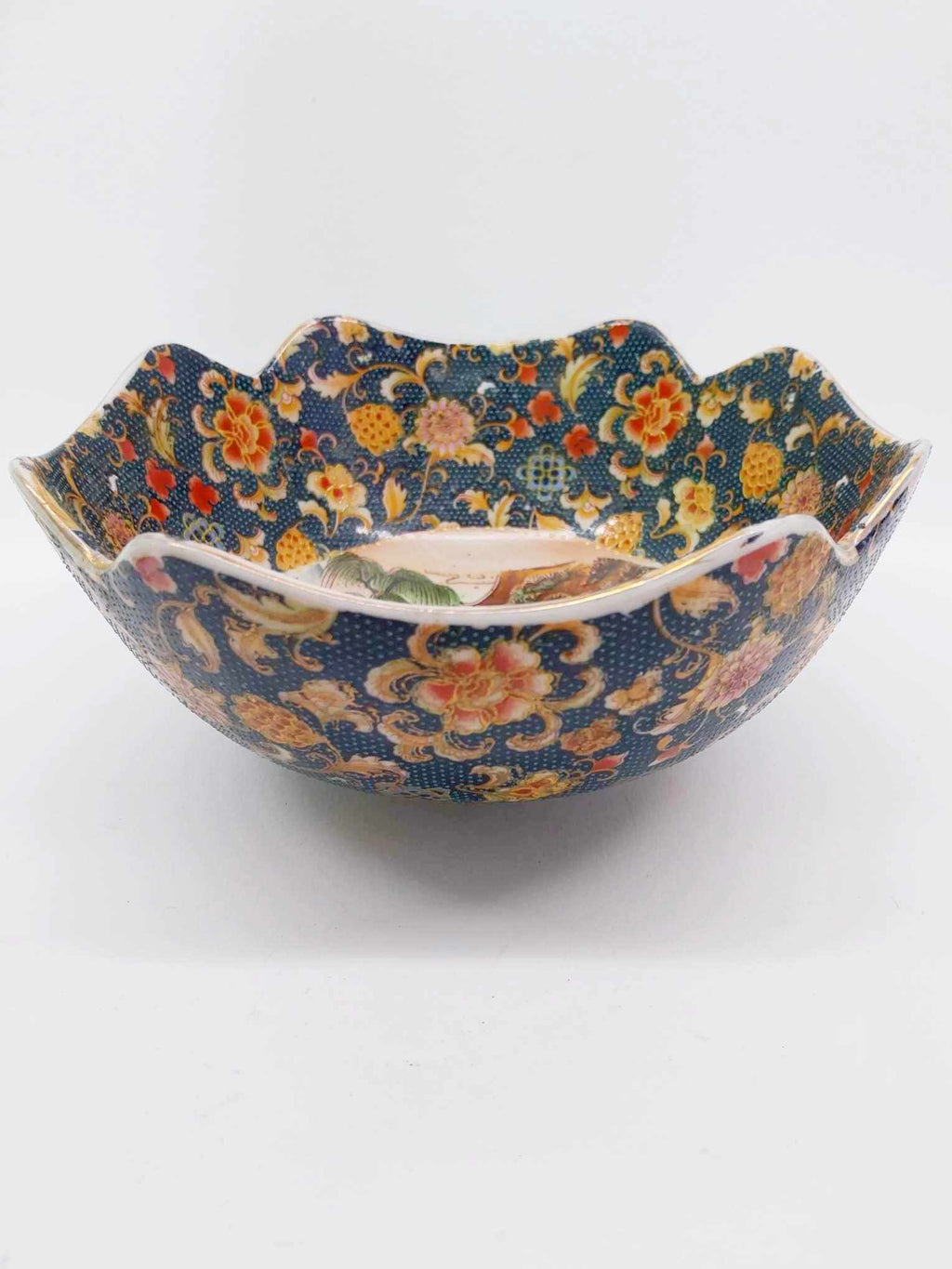 Vintage Japanese porcelain bowl with navy floral pattern, exterior view