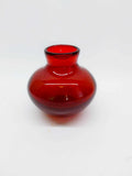 Vintage ruby-red glass vase from the 1980s, compact round form with narrow neck
