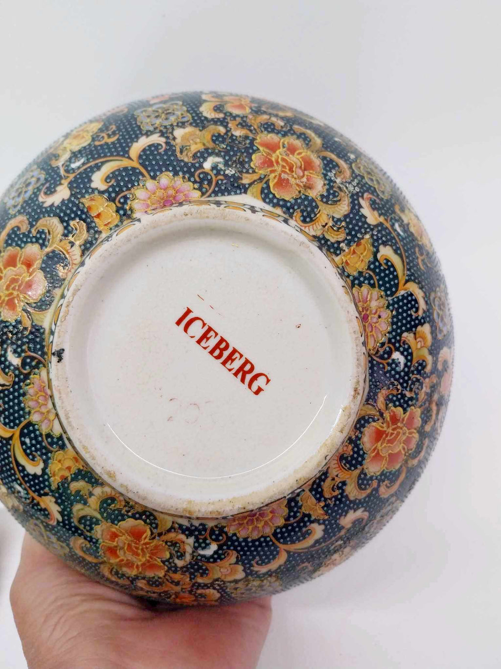 Base of vintage porcelain bowl showing ICEBERG maker's mark in red