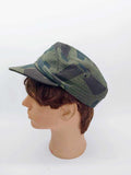Vintage Bulgarian military camouflage field cap on mannequin head