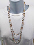 Vintage multi-strand beaded necklace on mannequin showing layered drape