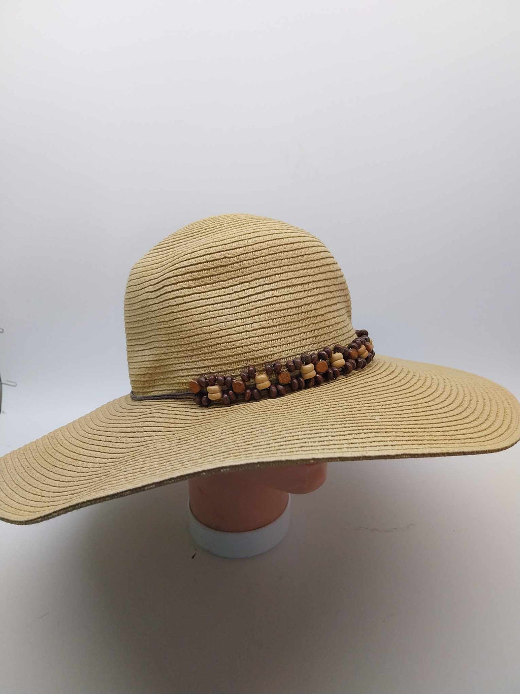 González SGV vintage straw wide brim hat with wooden bead band on mannequin head