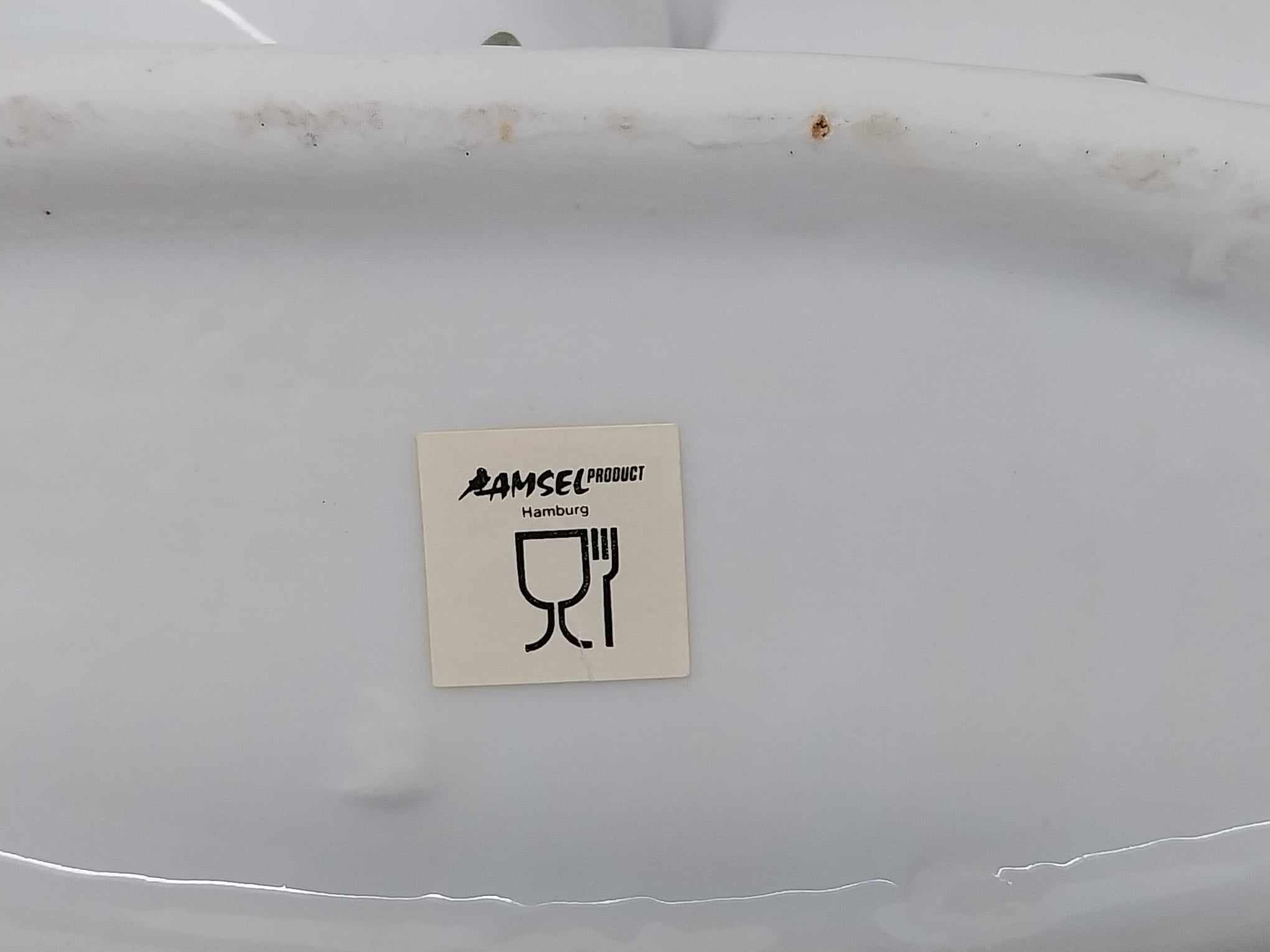 Ramsel Product Hamburg label on the bottom of the porcelain figurine