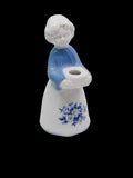Vintage porcelain woman candle holder with blue floral decoration