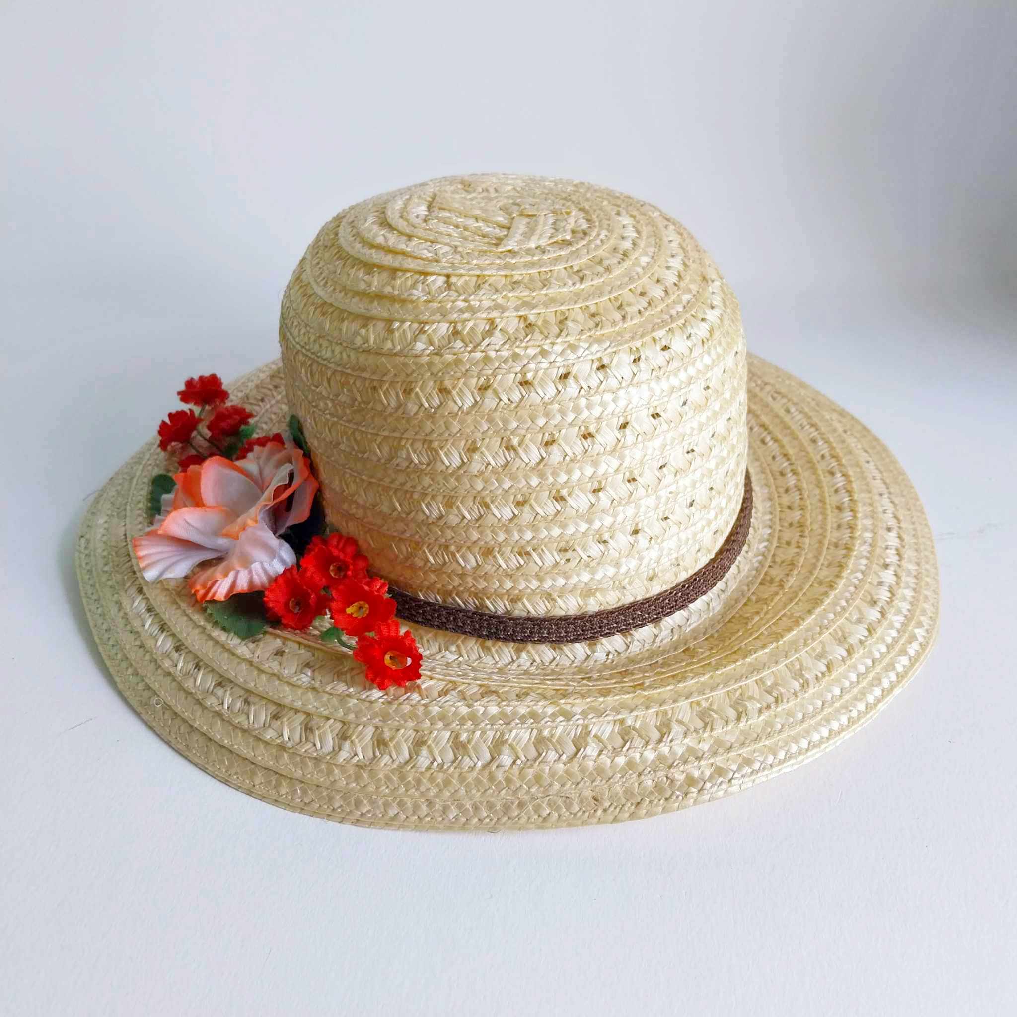 Vintage women's straw hat with flowers