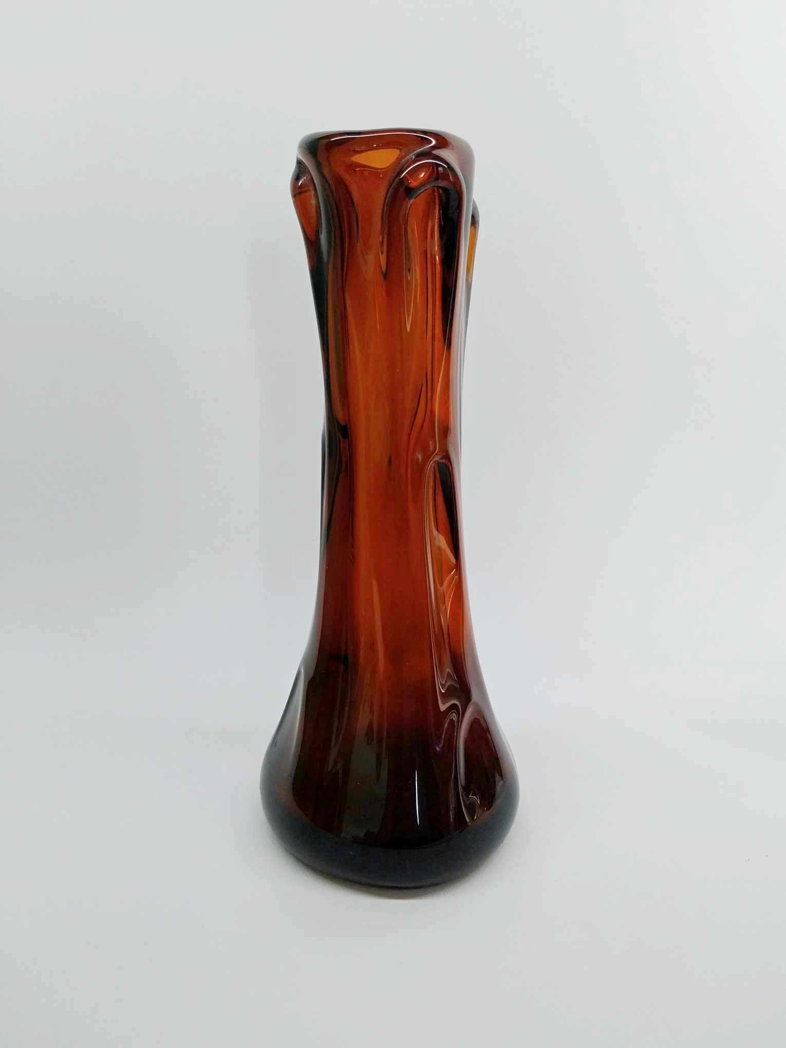 Vintage hand-blown amber glass sculptural vase with narrow waist and pinched rim, 1970s studio glass