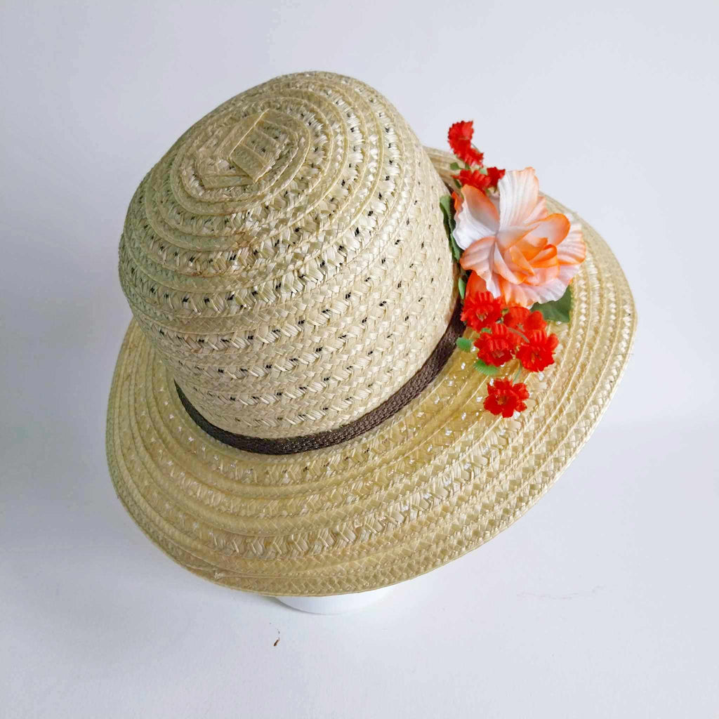 Vintage women's straw hat with flowers