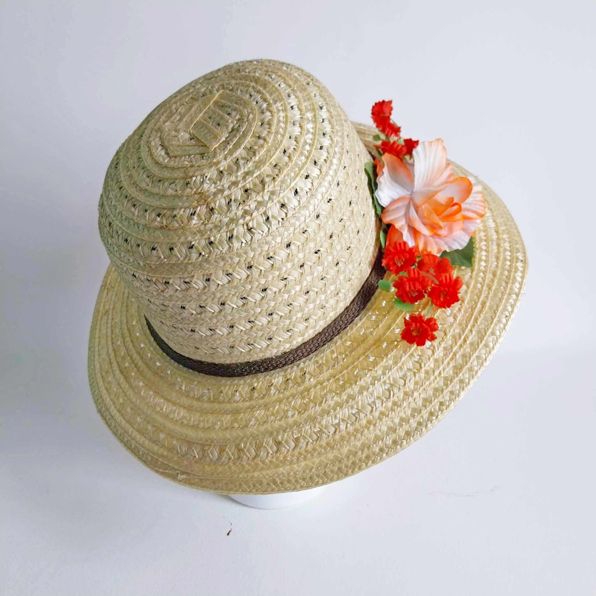 Vintage women's straw hat with flowers
