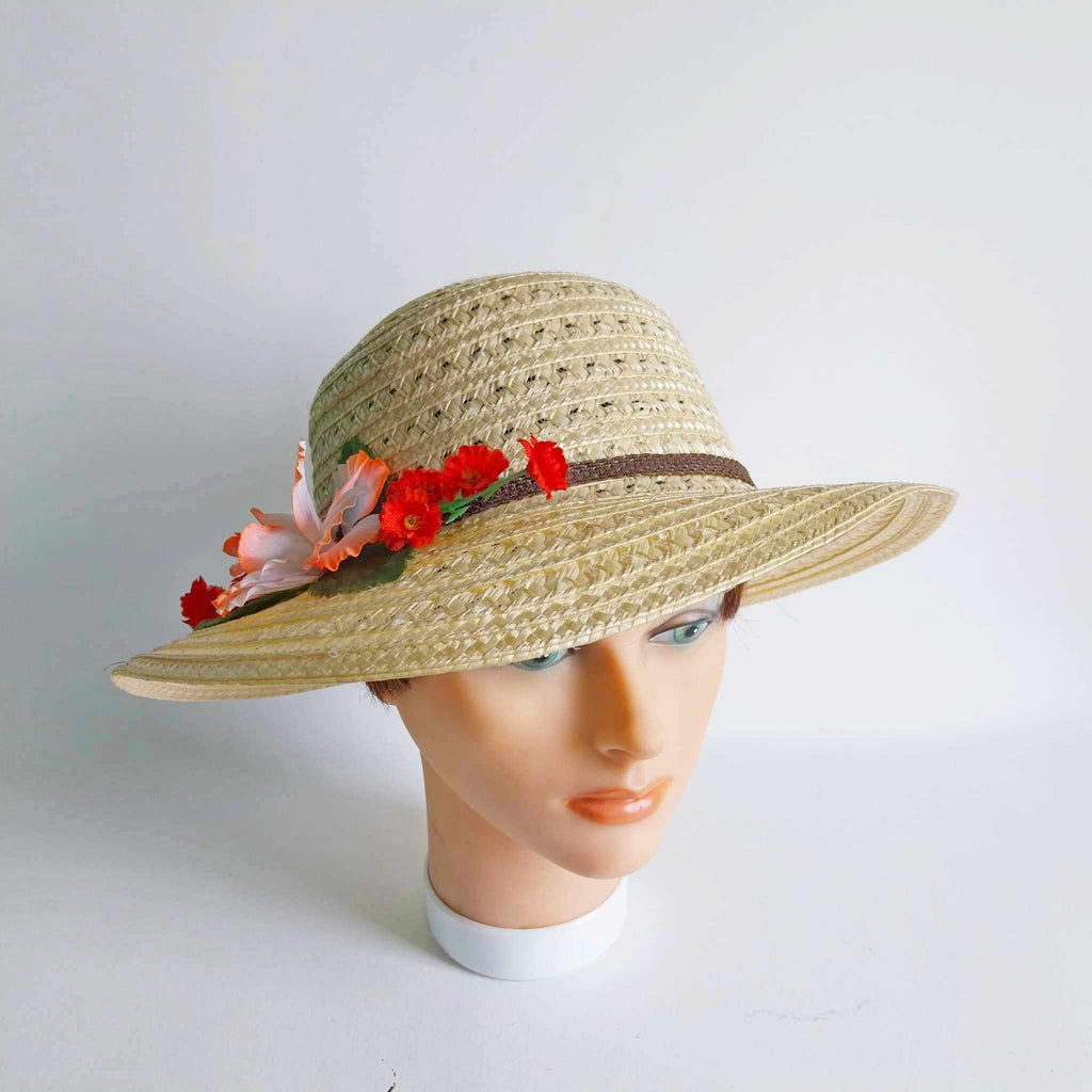 Vintage women's straw hat with flowers