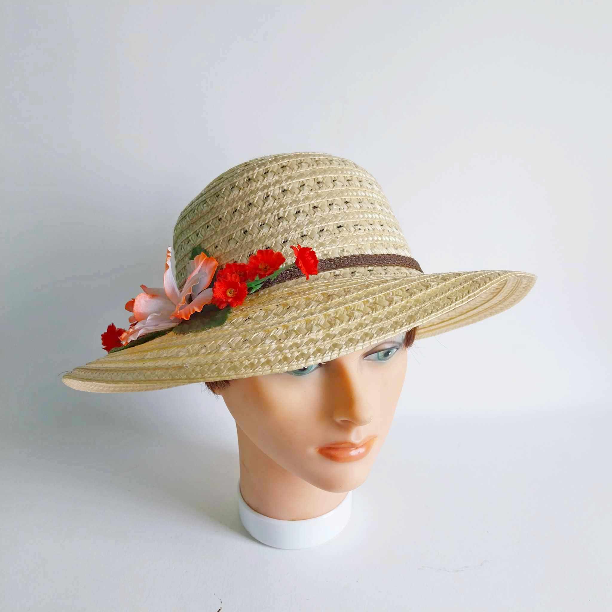 Vintage women's straw hat with flowers