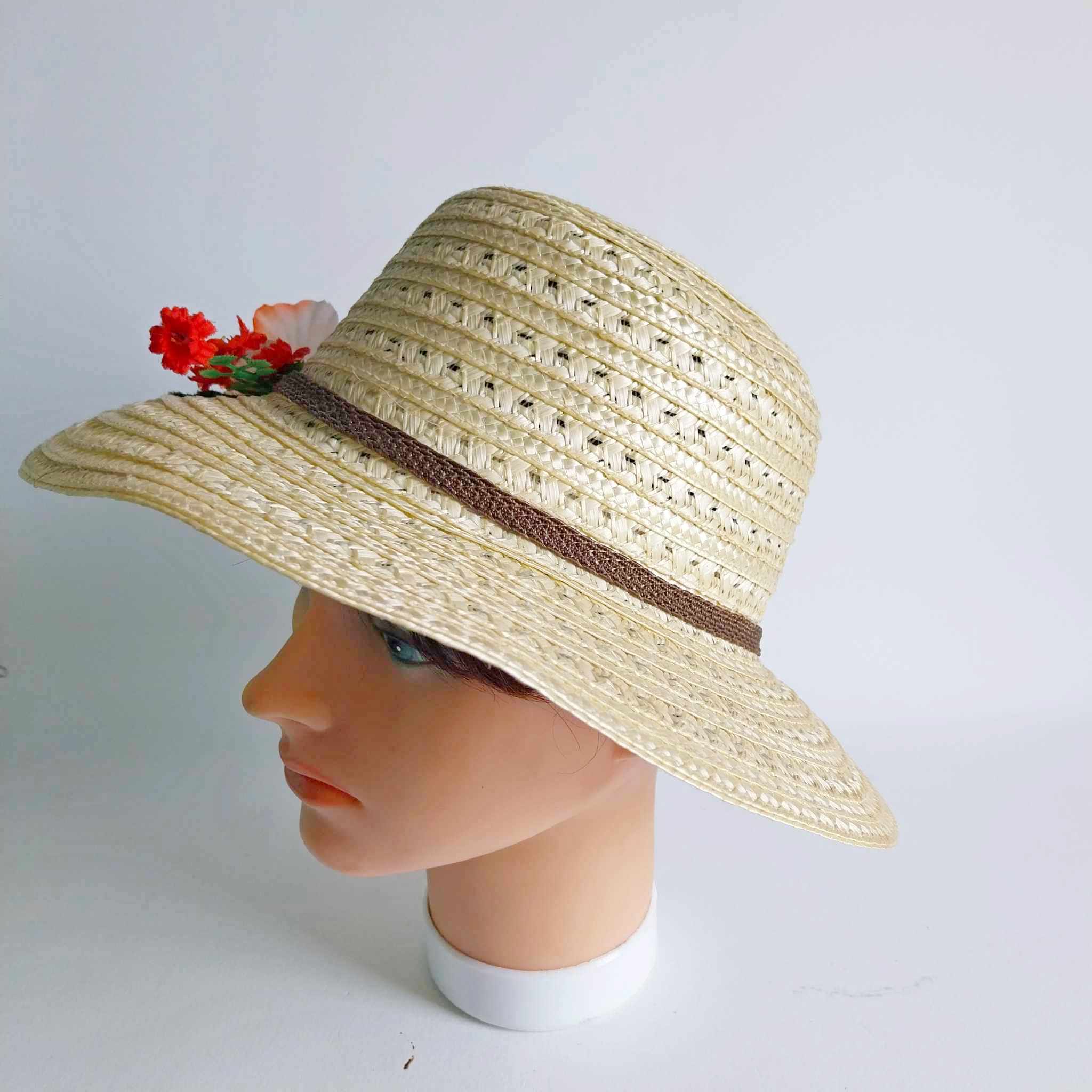 Vintage women's straw hat with flowers