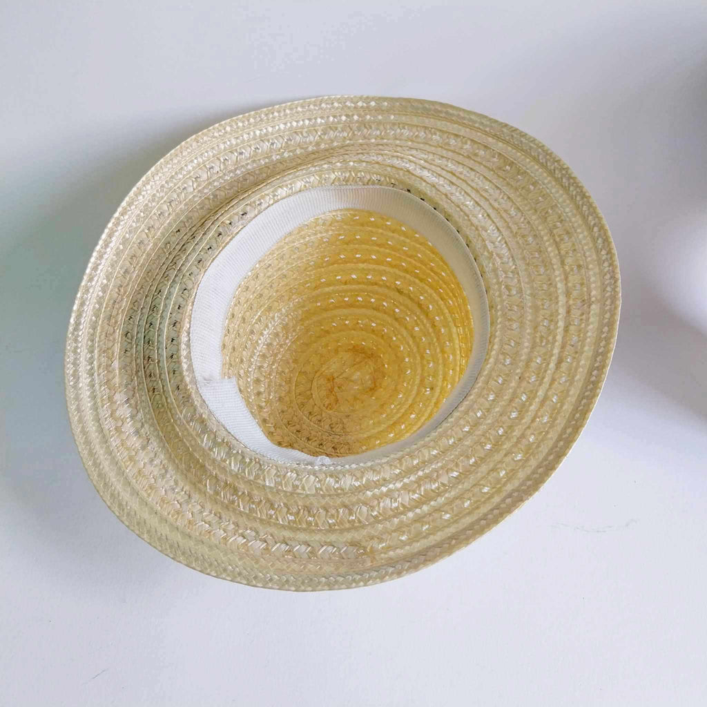 Vintage women's straw hat with flowers