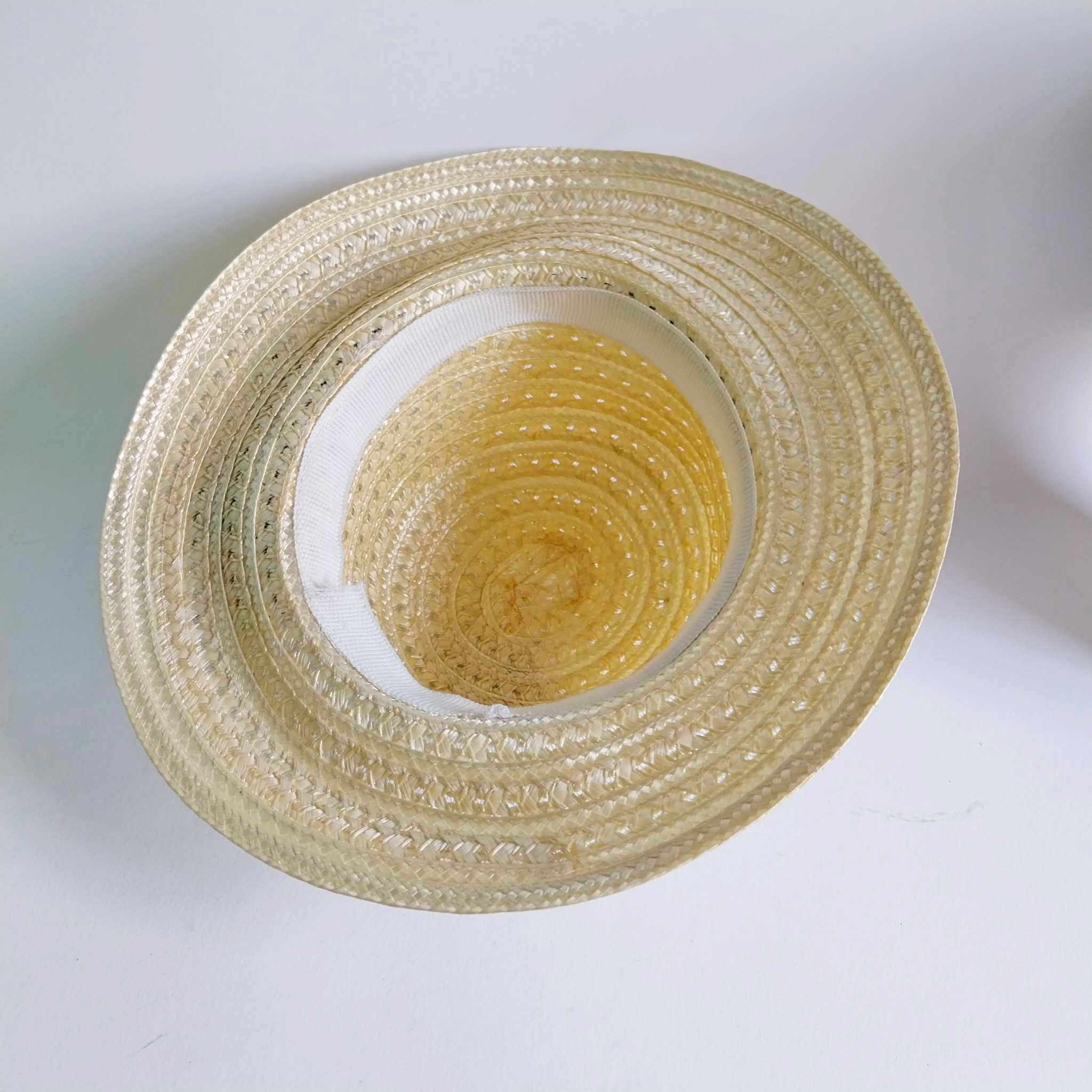 Vintage women's straw hat with flowers