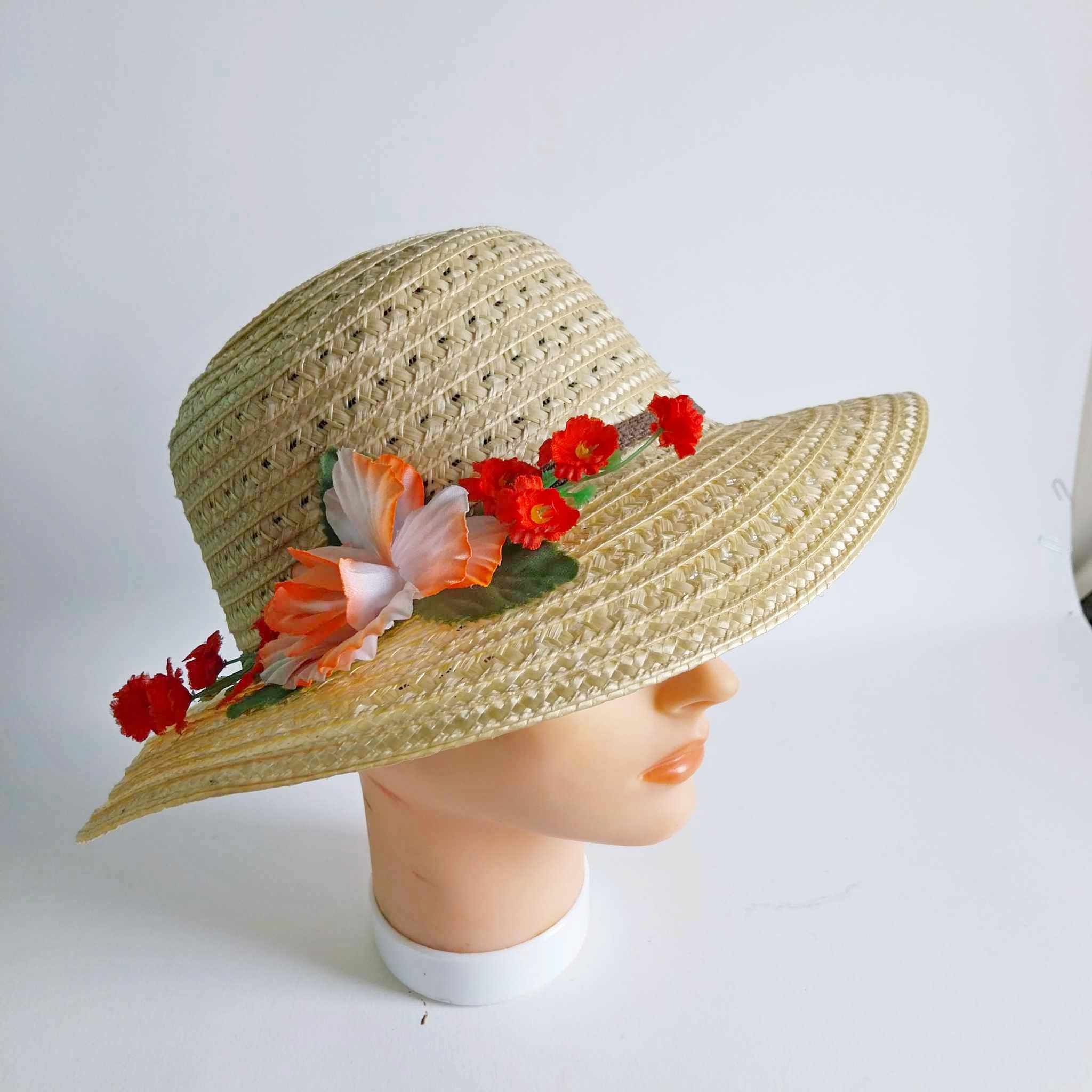 Vintage women's straw hat with flowers