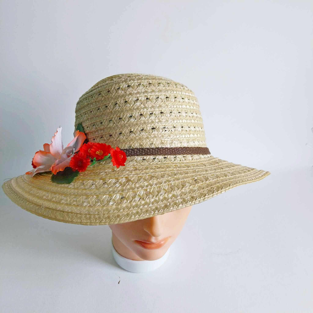 Vintage women's straw hat with flowers