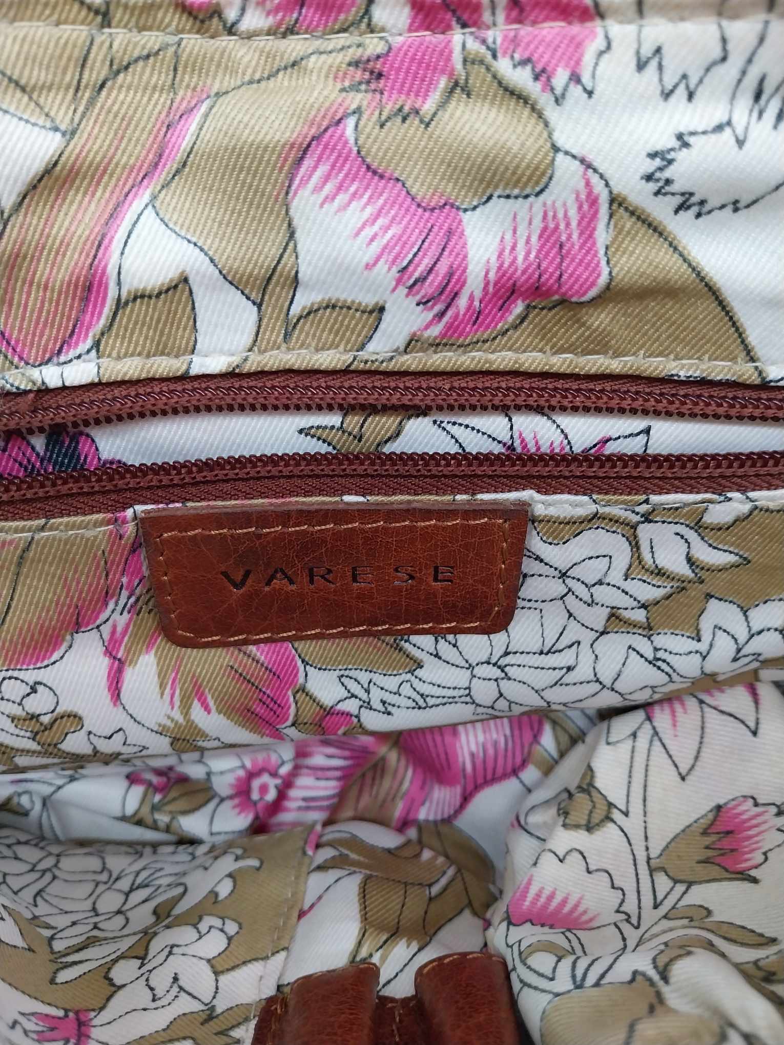 Varese vintage leather crossbody bag — front view with buckle pocket