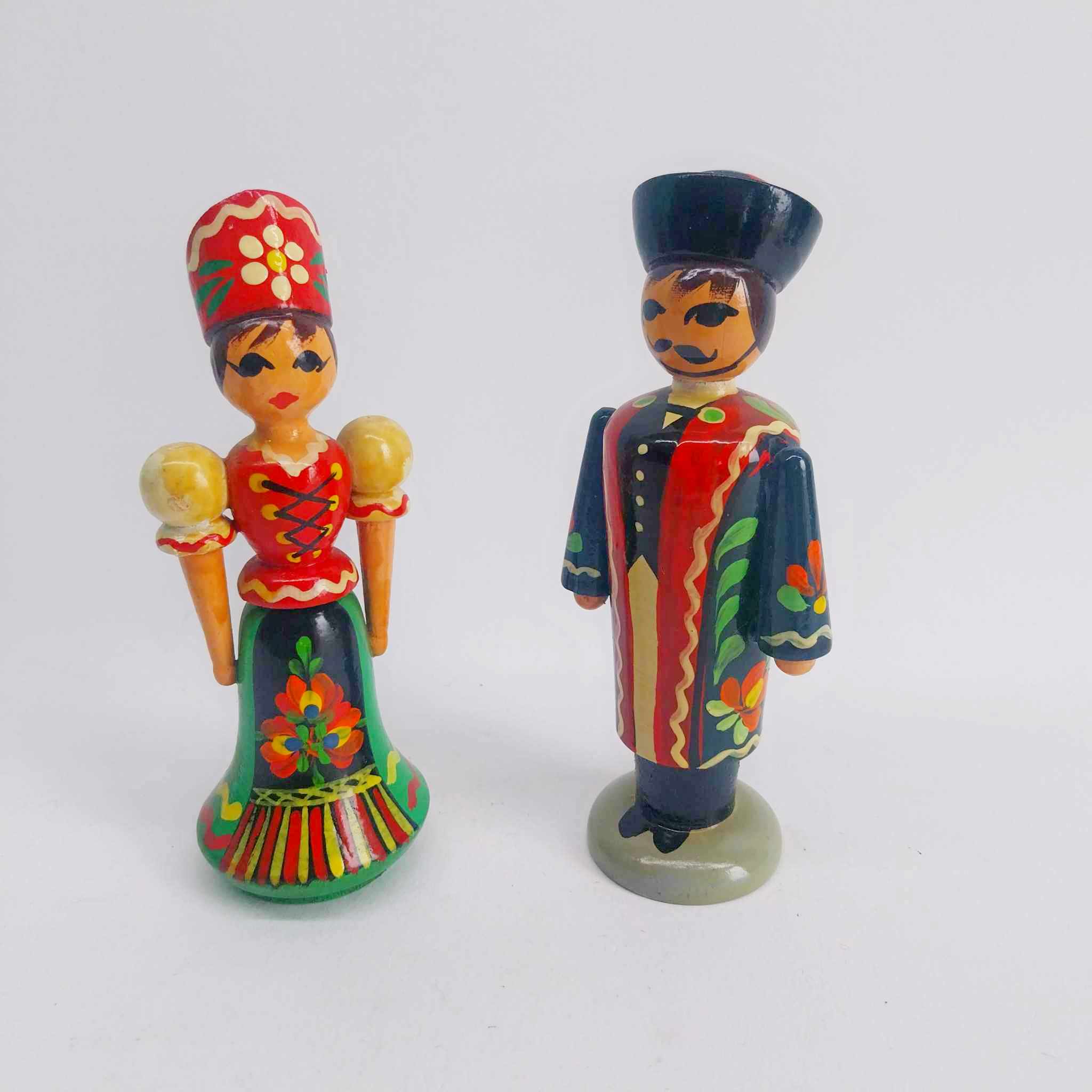 Two hand-painted wooden dolls from the USSR, 1980s