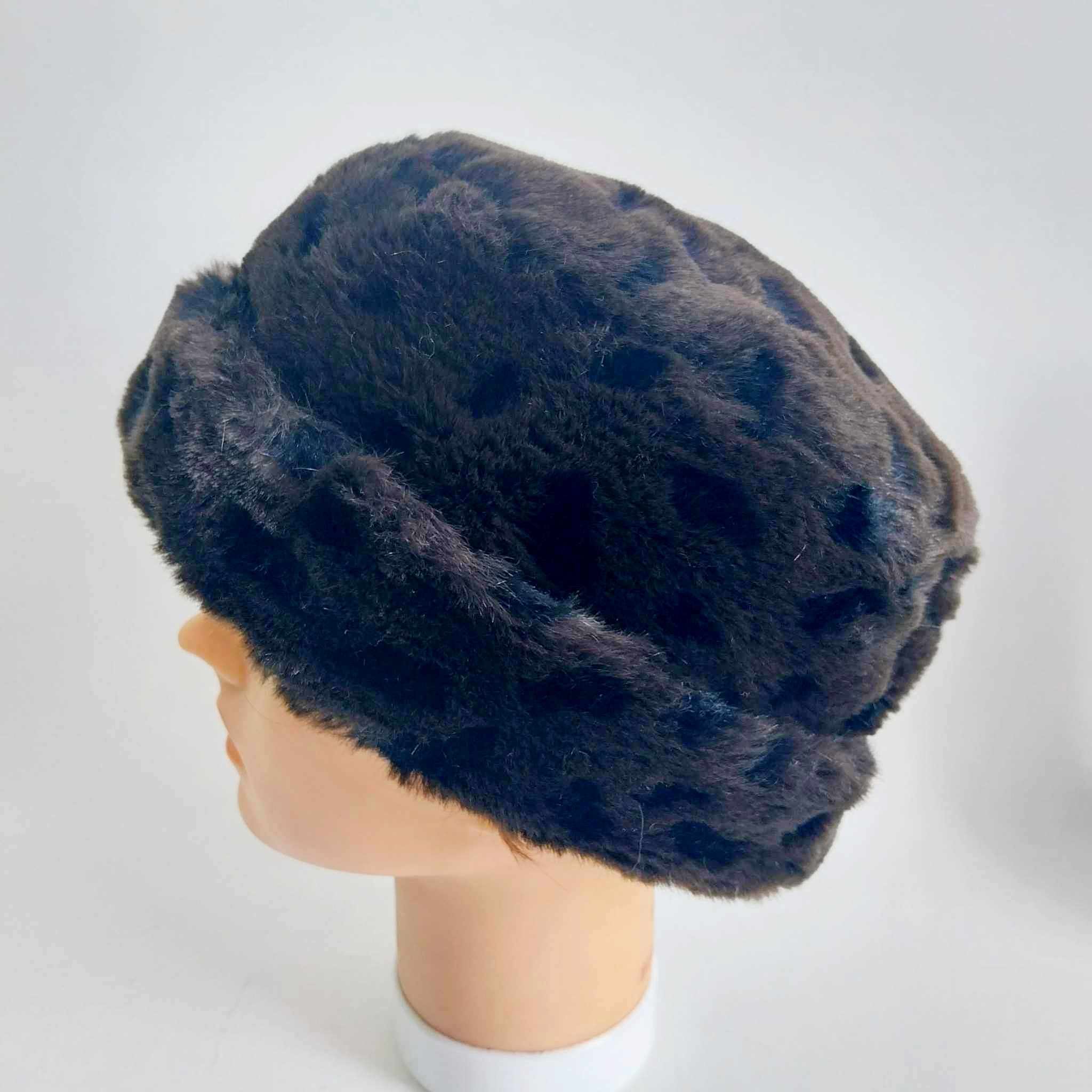 Vintage dark brown faux fur Cossack beret hat displayed on mannequin head