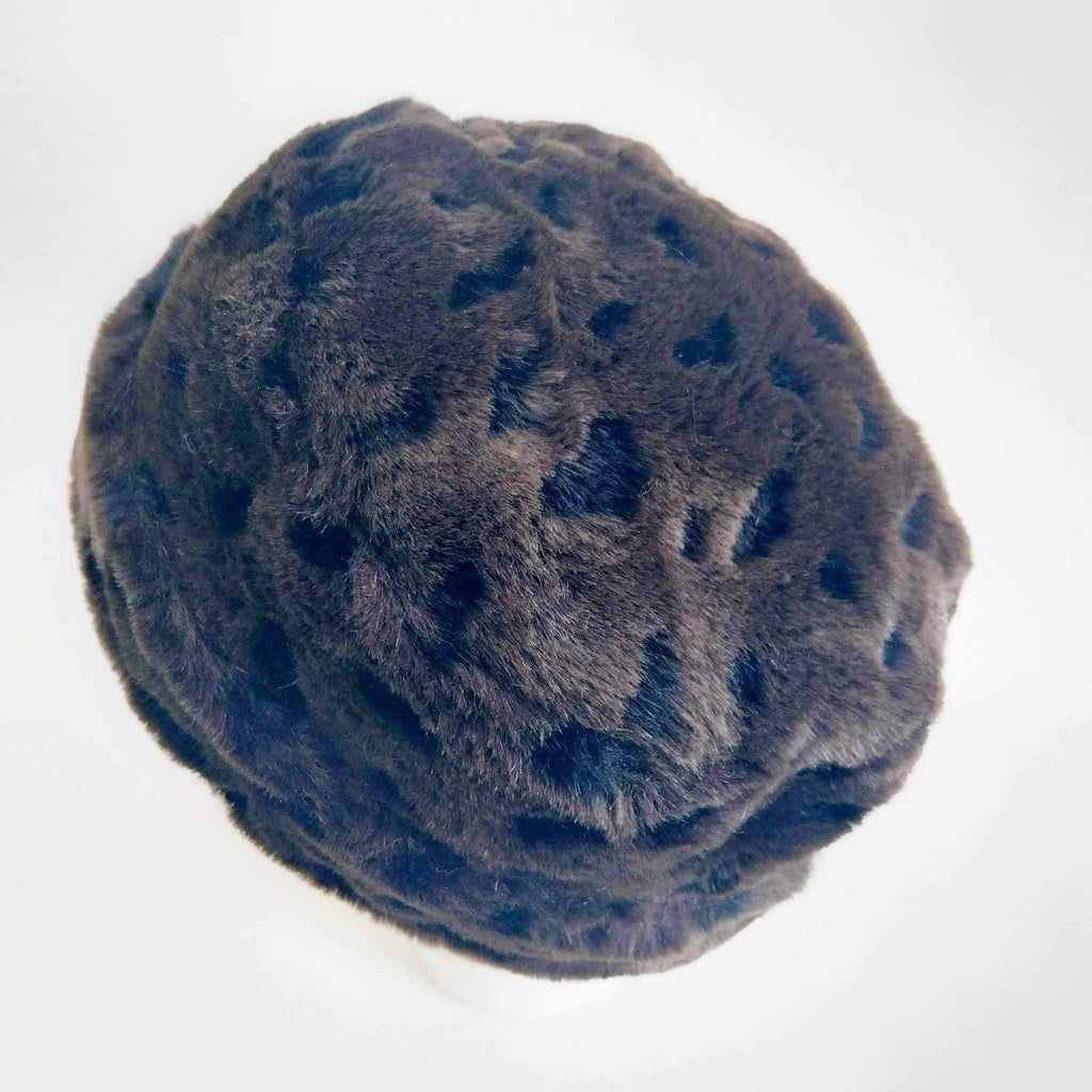 Top view of vintage dark brown faux fur hat showing subtle spotted mottled pattern in the pile