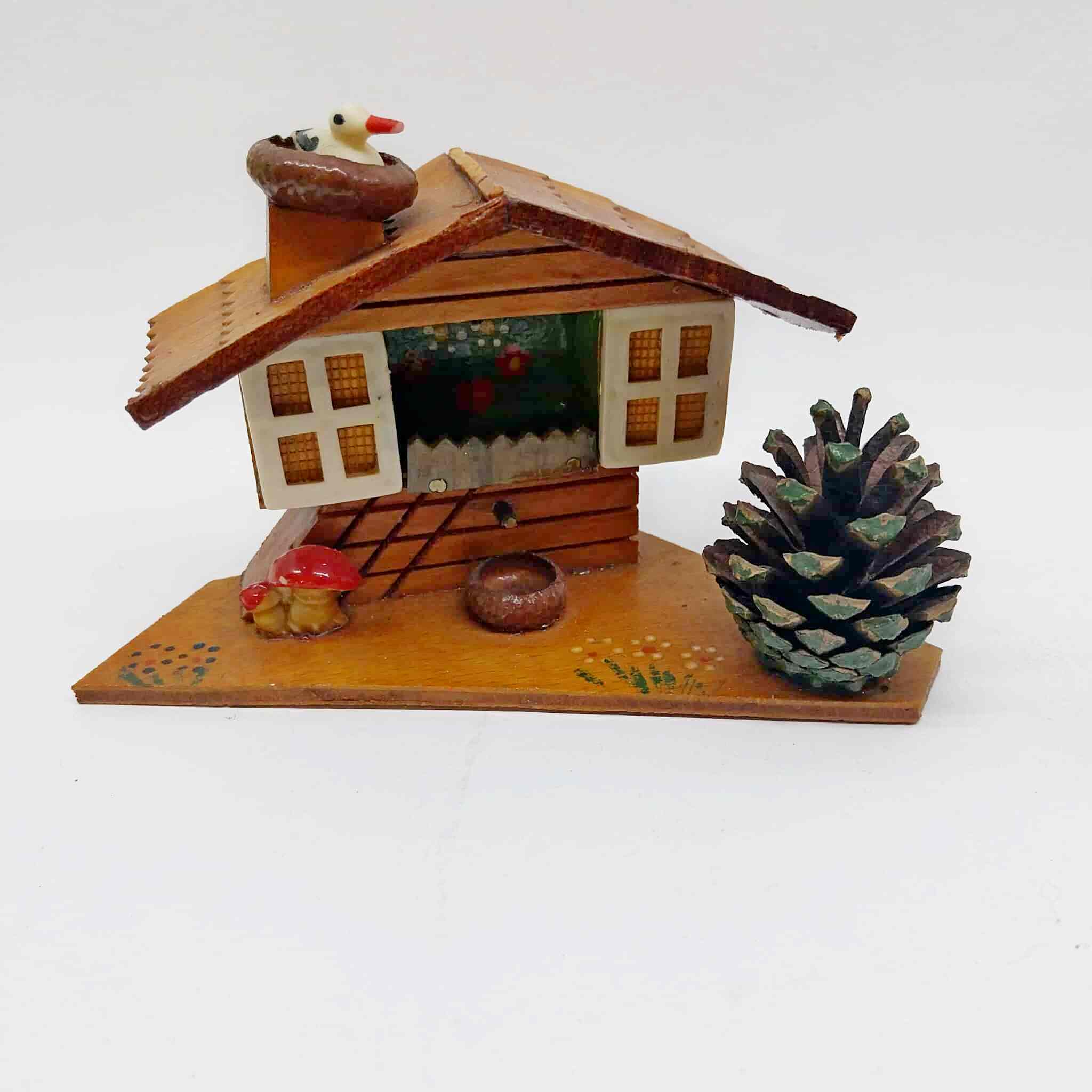 Vintage Bulgarian folk art miniature wooden house with stork, mushroom and pine cone