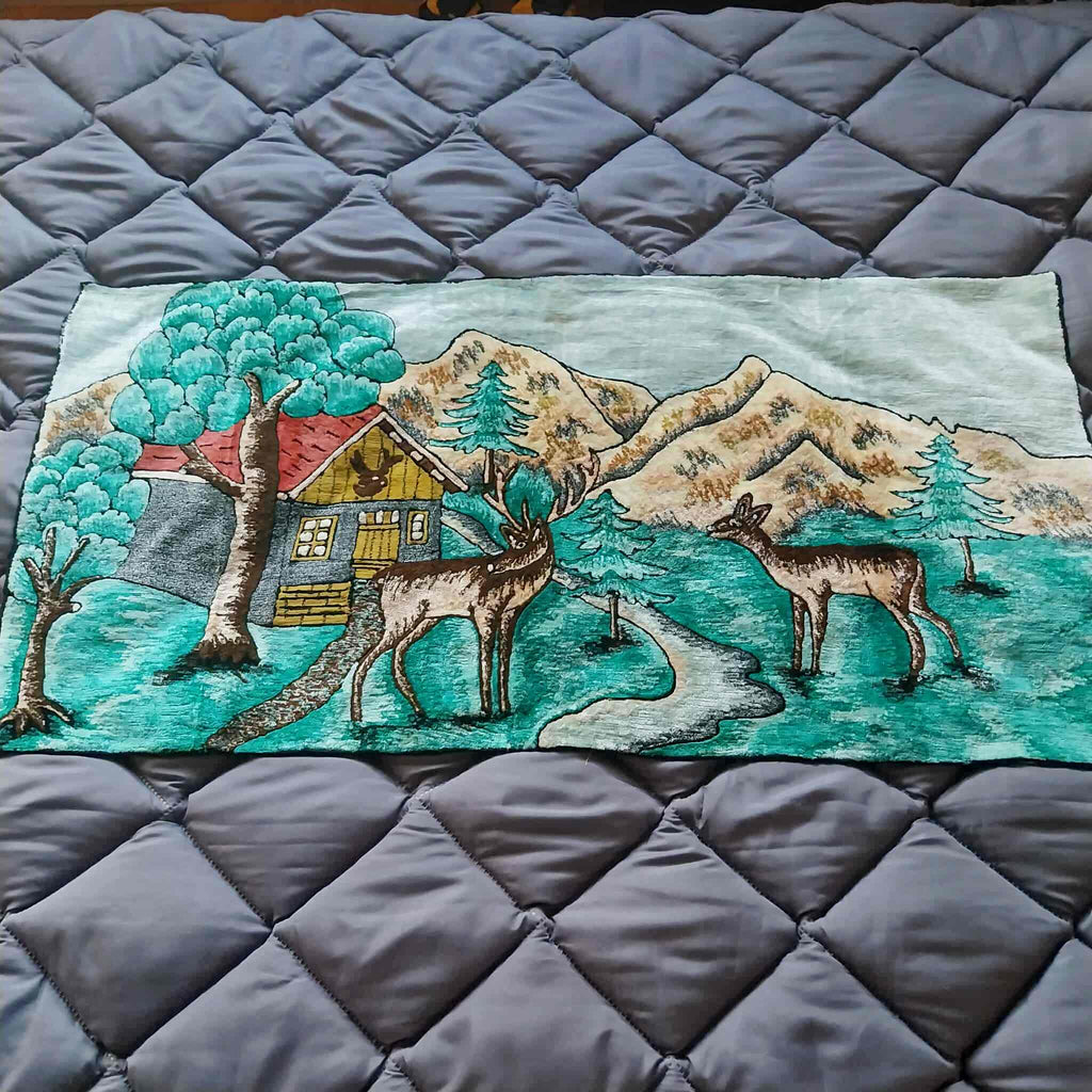 Vintage plush wall tapestry with Alpine deer, mountain cabin and pine trees in teal tones