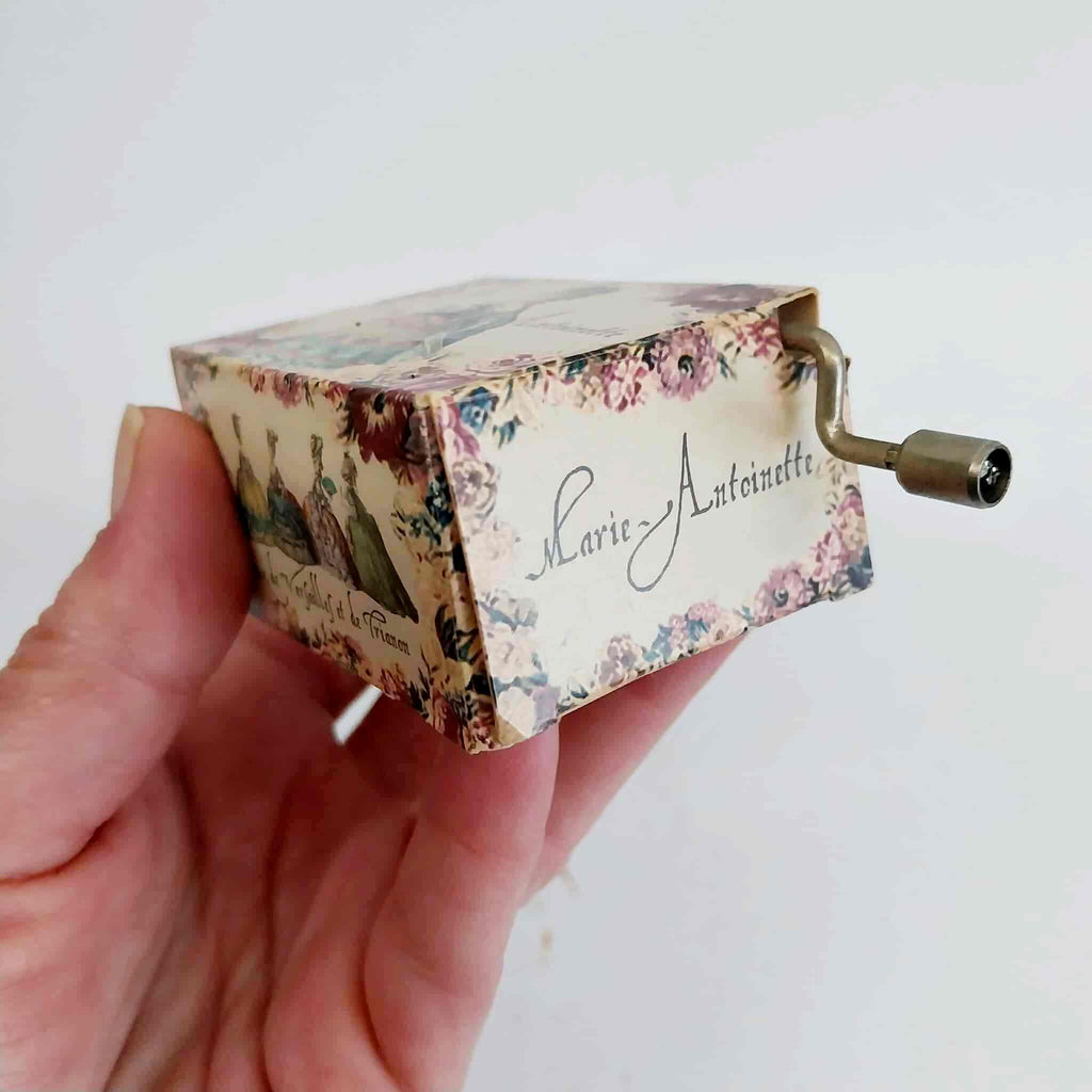 Marie Antoinette music box side view with hand crank