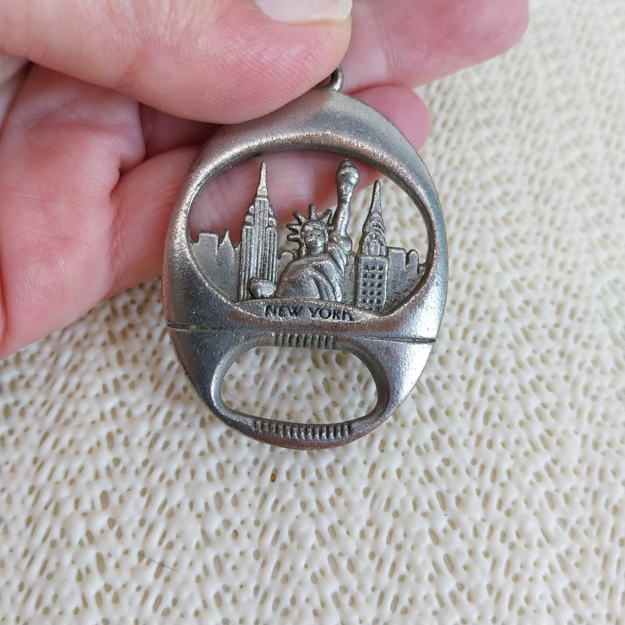 Vintage New York keychain bottle opener – back view close-up