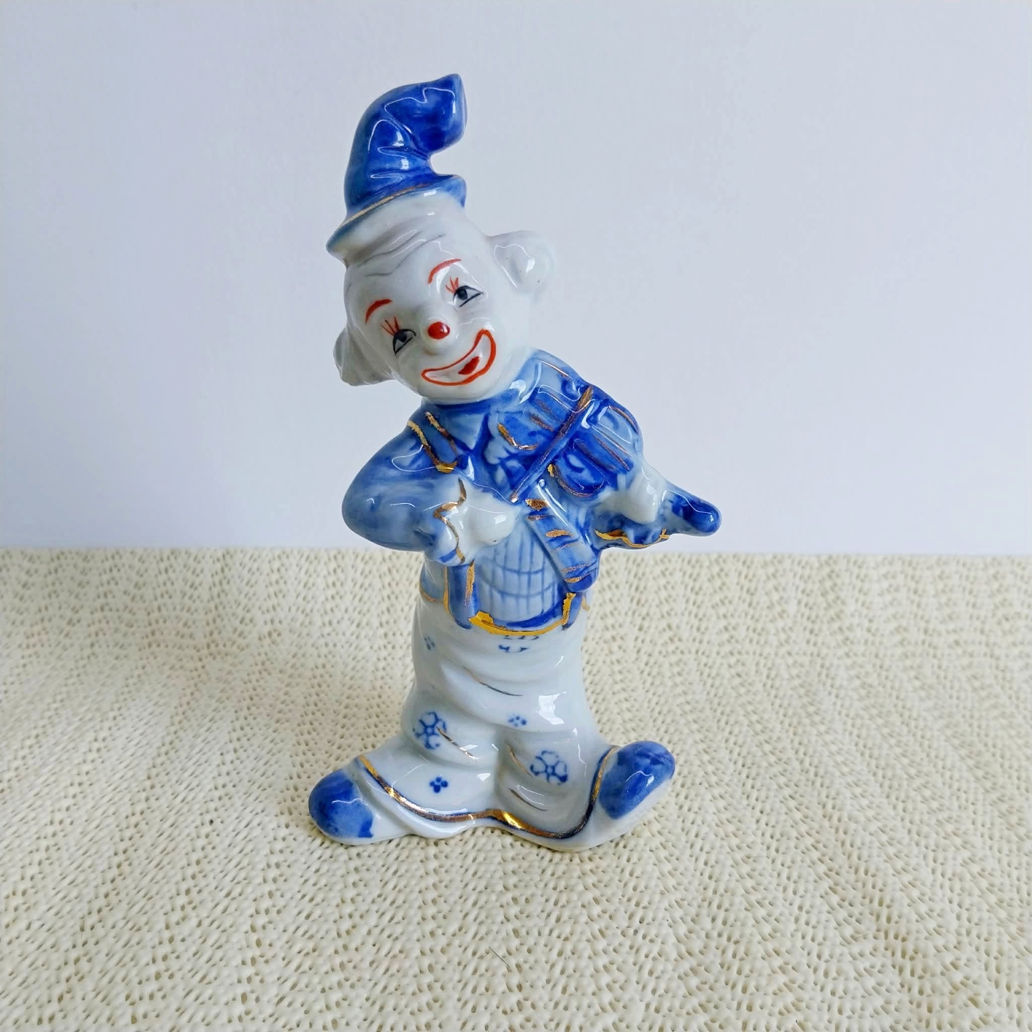 Vintage porcelain clown figurine – front view