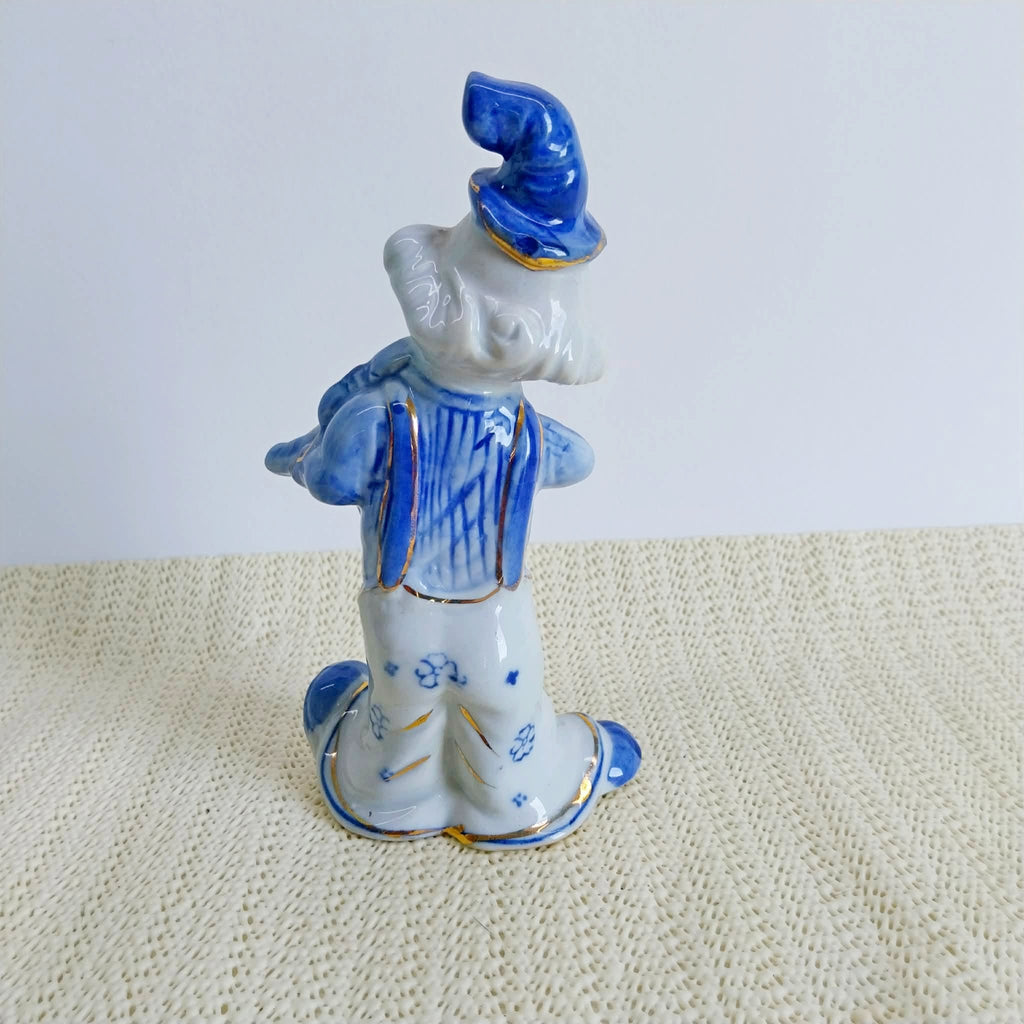 Vintage porcelain clown figurine – back view