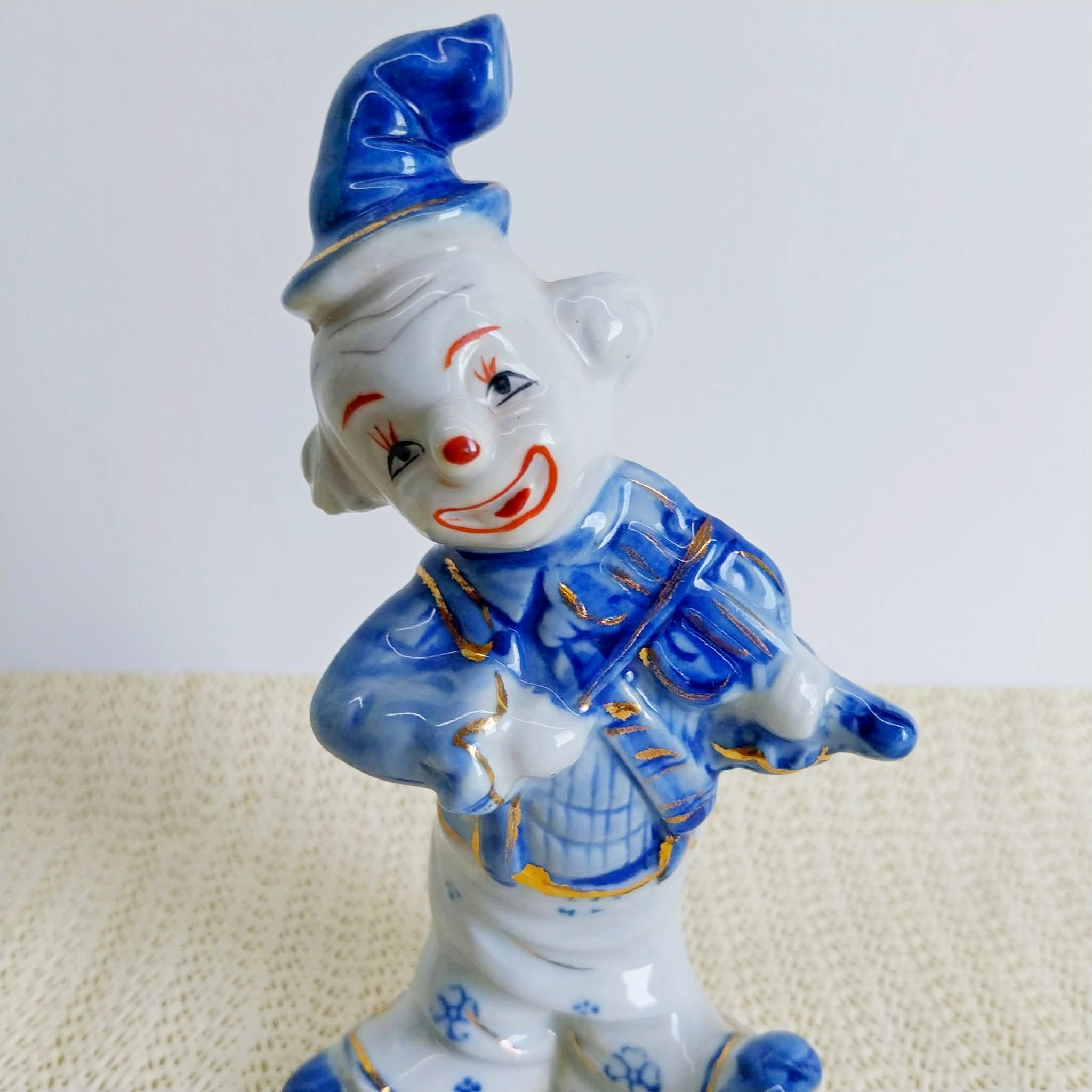 Vintage Porcelain Clown Figurine – Blue & White with Gold Accents