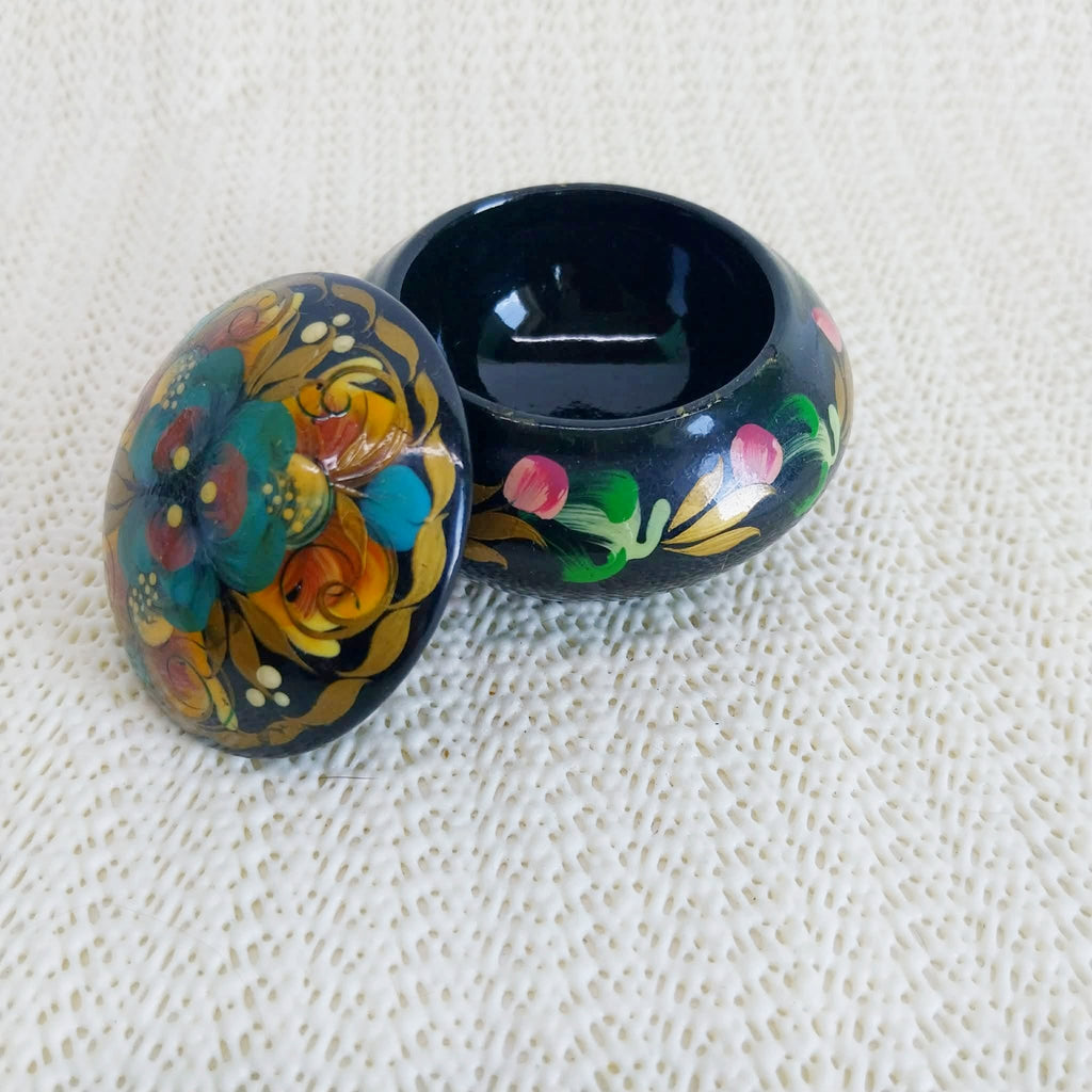 Vintage Ukrainian lacquered wooden trinket box open — showing black interior and floral decoration