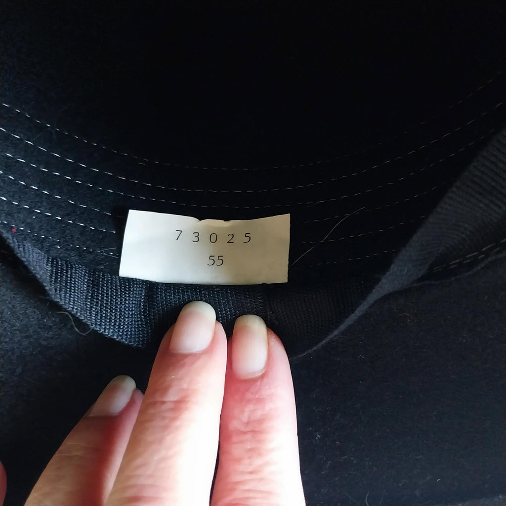 Size label showing 73025 and size 55