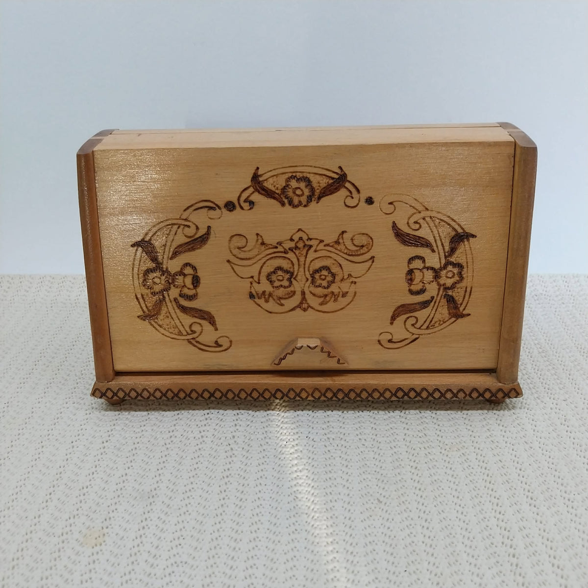 Wooden expanding cigarette box with pyrography — fully open, top view