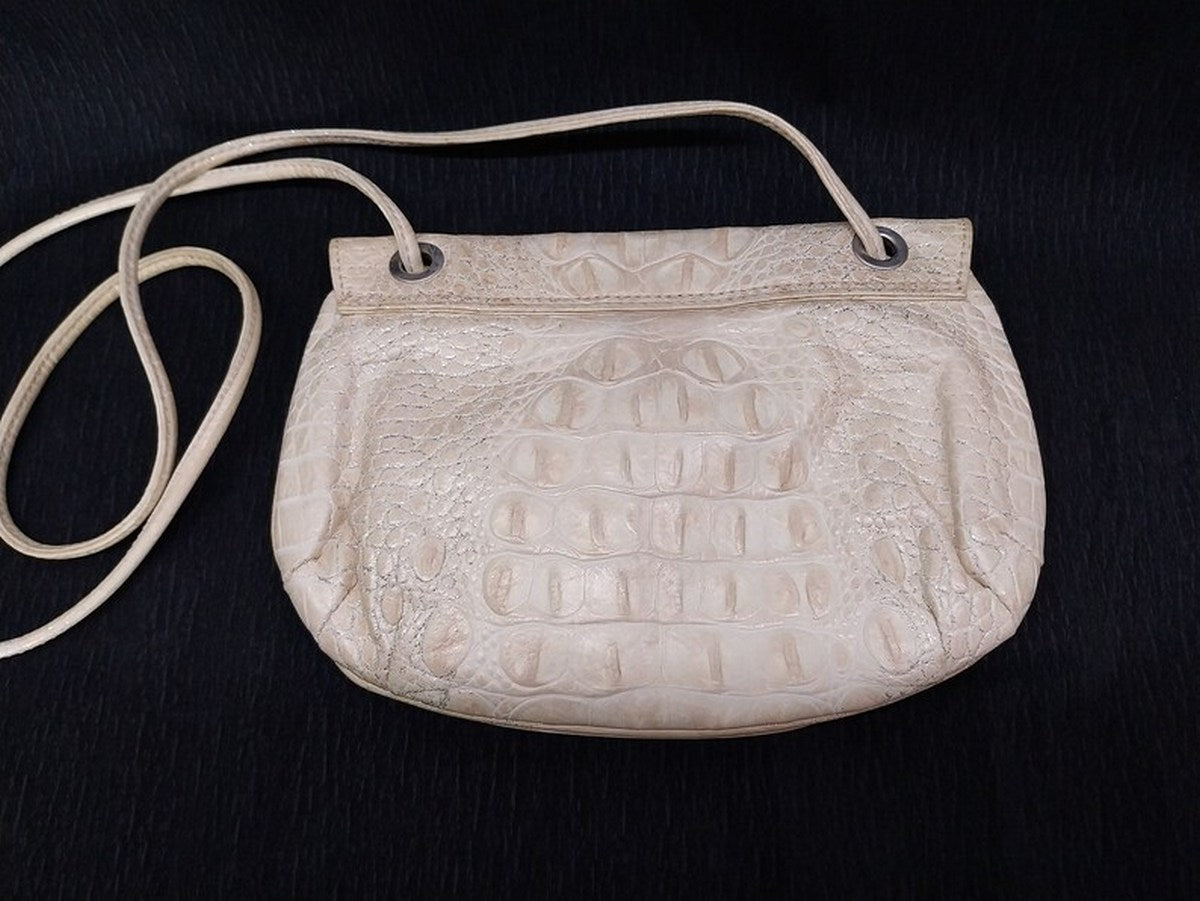 Vintage Italian leather bag "I Santi" cream color with silver brocade