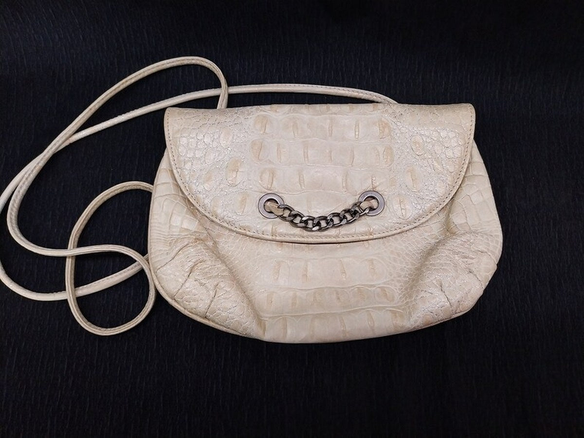 Vintage Italian leather bag "I Santi" cream color with silver brocade