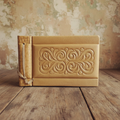 Vintage leather photo album with relief floral ornament