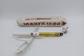 Soviet vintage electric lighter Zazhigalka ZZZ with original cardboard box on light concrete surface